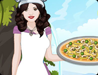 Selena Cooking Hummus Pizza